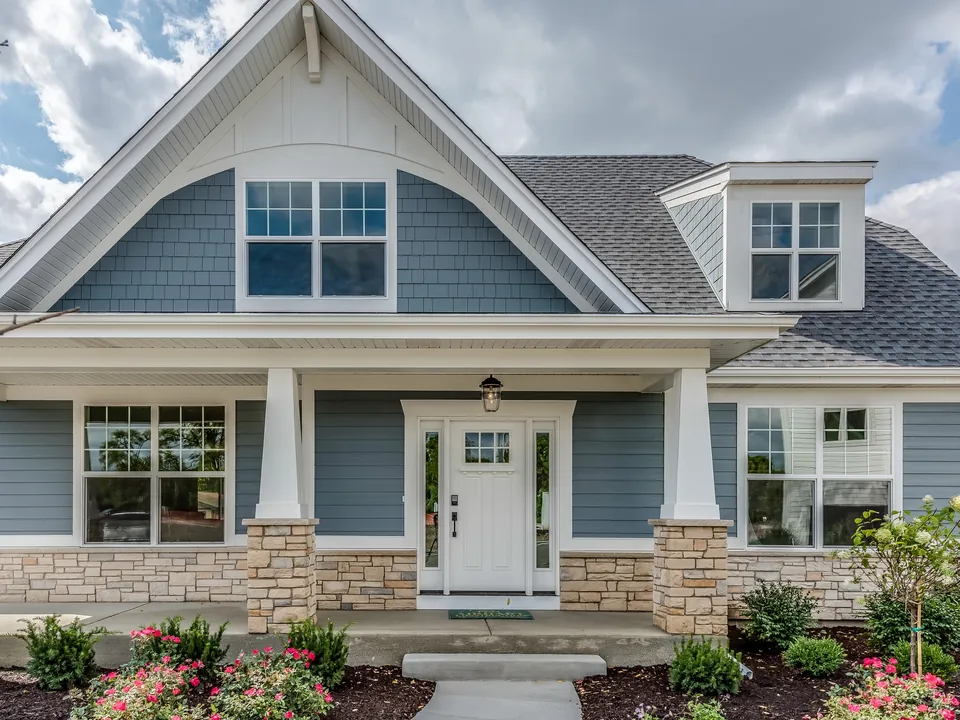 Home with new vinyl siding installed by Vista Home Improvement